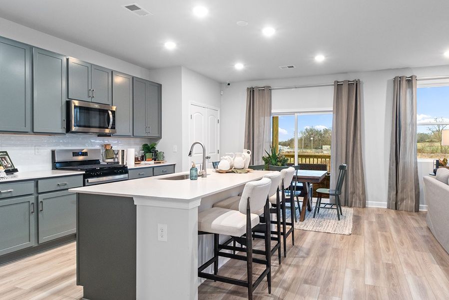 A kitchen with a large island.