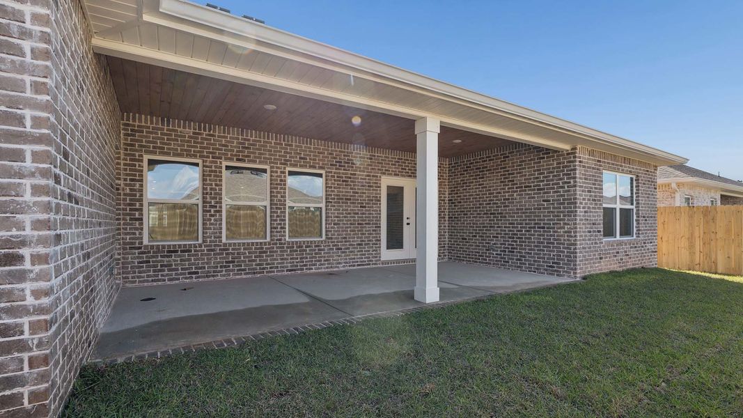 Exterior details and patio area of a home in Owl's Head Farms, Freeport (Image 3).