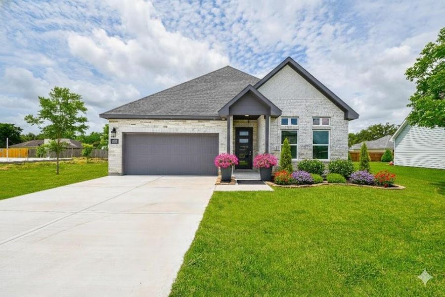Front exterior of a new home in , Sweeny, TX, highlighting curb appeal (Image 1). Front exterior of a new home in , Sweeny, TX, highlighting curb appeal (Image 1).