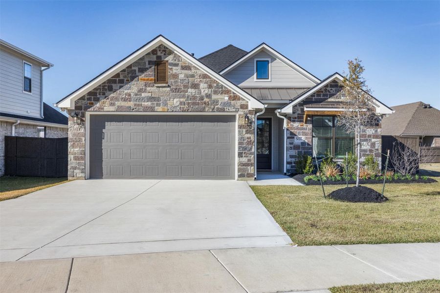 Front exterior of a new home in , Bryan, TX, highlighting curb appeal (Image 27).