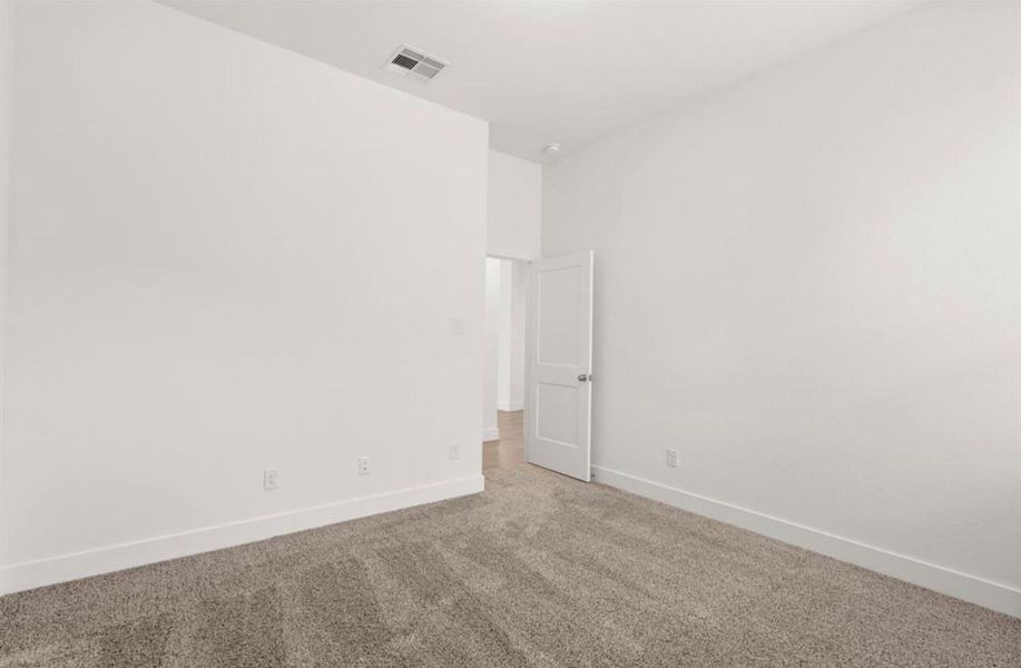 Spacious, unfurnished interior of a new home in Sunterra, Katy (Image 14).