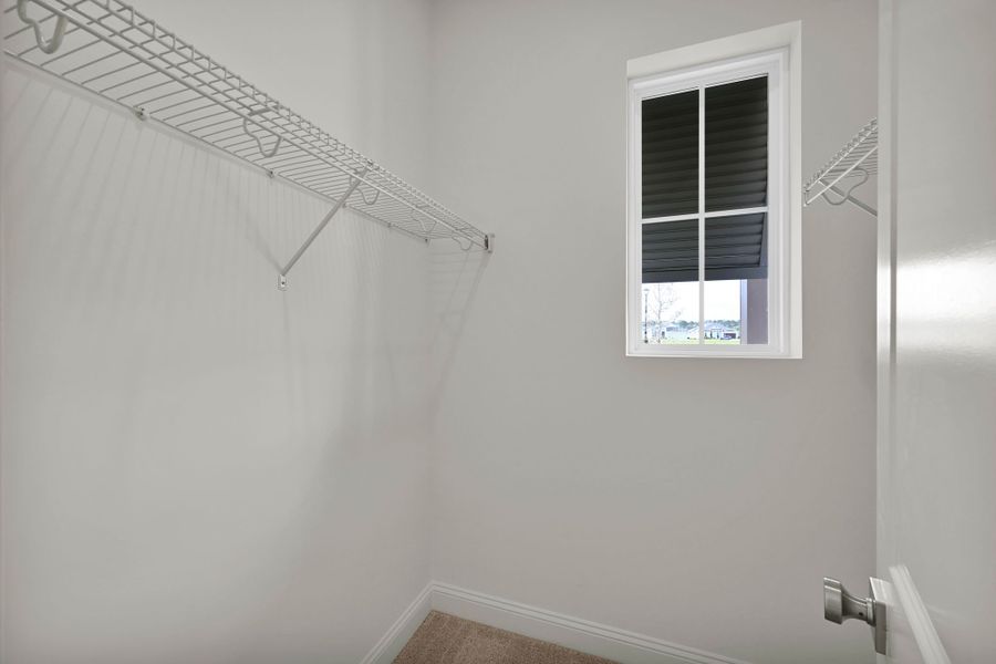 Representative unfurnished interior of a home built from the Hudson II by Riverside Homes in Hidden Creek at SilverLeaf 70' Series, St. Augustine (Image 20).