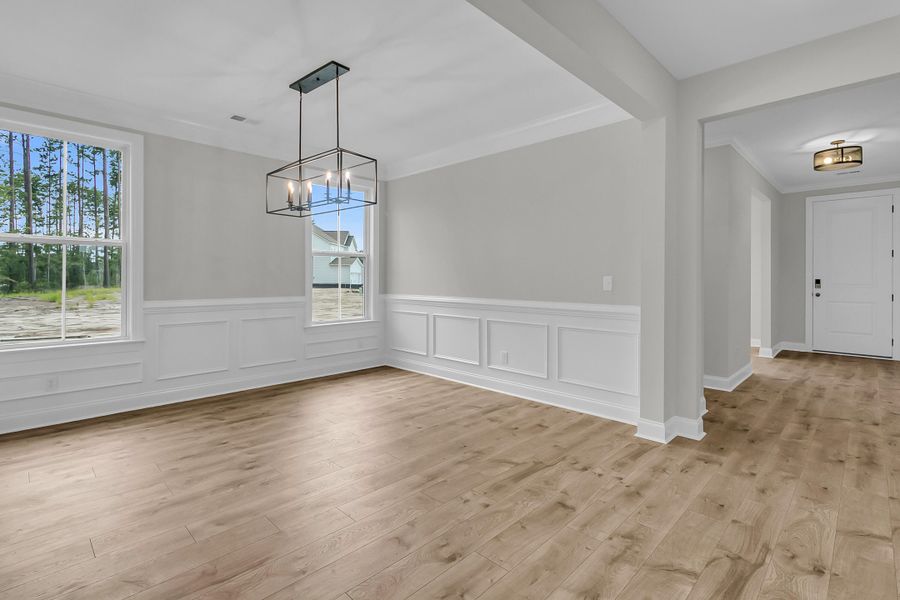Spacious, unfurnished interior of a new home in Tidewater at Lakes of Cane Bay, Summerville (Image 23).