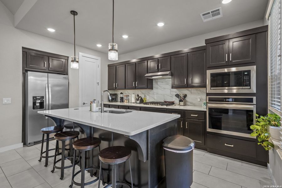 Furnished interior view inside a new home in VIDA, San Antonio (Image 11).