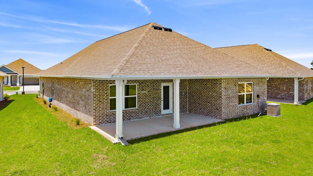 Exterior details and patio area of a home in Owl's Head Farms, Freeport (Image 3).