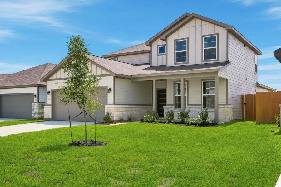 Front exterior of a new home in Mirabella, Brookshire, TX, highlighting curb appeal (Image 2). Front exterior of a new home in Mirabella, Brookshire, TX, highlighting curb appeal (Image 2).