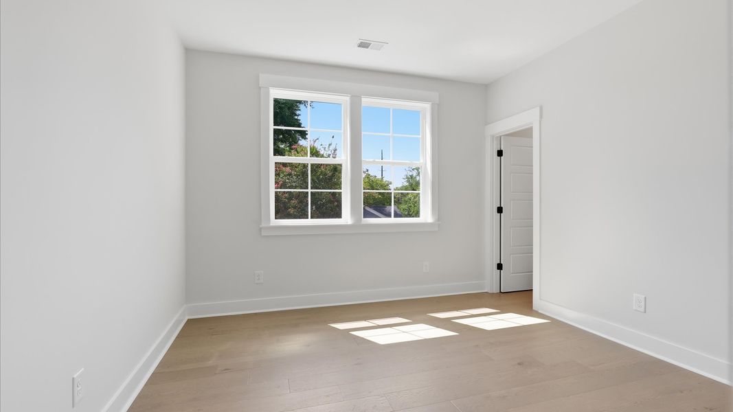 Representative furnished interior of a home built from the Lighthouse II by DRB Homes in Bayview Acres, Mount Pleasant (Image 19).