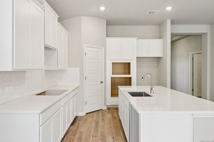 Furnished interior view inside a new home in Estancia Ranch - Classic Series, San Antonio (Image 8).