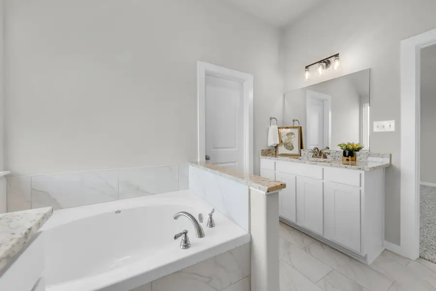 Representative furnished interior of a home built from the The Poppy by Avonley Homes in Rudder Pointe, Bryan (Image 6).