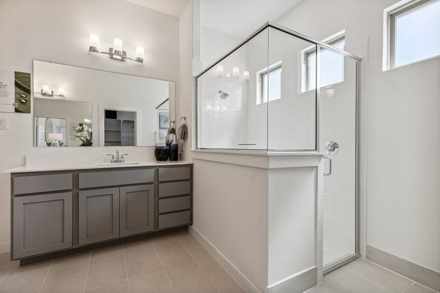 Primary Bathroom in the Van Gogh II home plan by Trophy Signature Homes – REPRESENTATIVE PHOTO