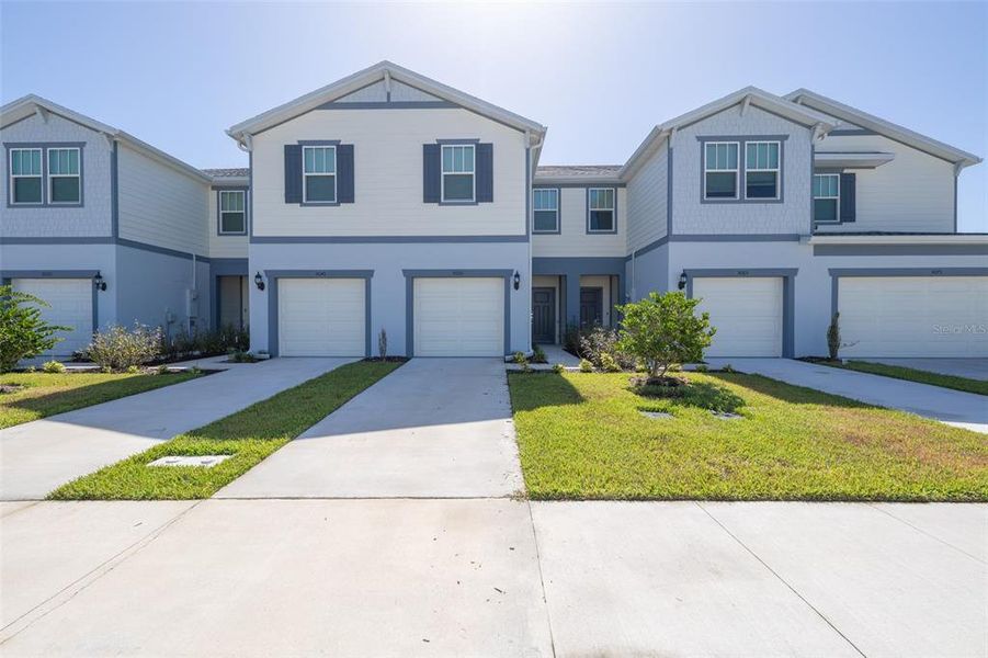 Front exterior of a new home in , Melbourne, FL, highlighting curb appeal (Image 1). Front exterior of a new home in , Melbourne, FL, highlighting curb appeal (Image 1).