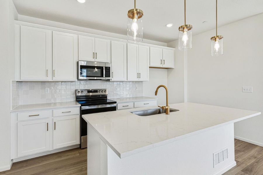 Furnished interior view inside a new home in Turnberry Villas, Commerce City (Image 5).