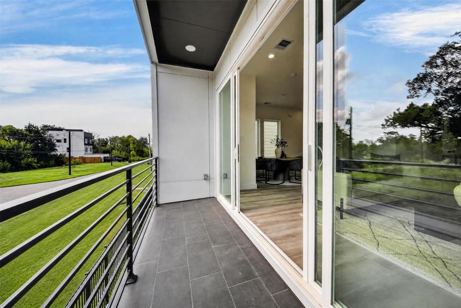 Exterior details and patio area of a home in , Houston (Image 3).
