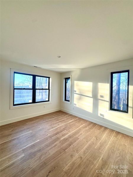Spacious, unfurnished interior of a new home in , Waynesville (Image 10).