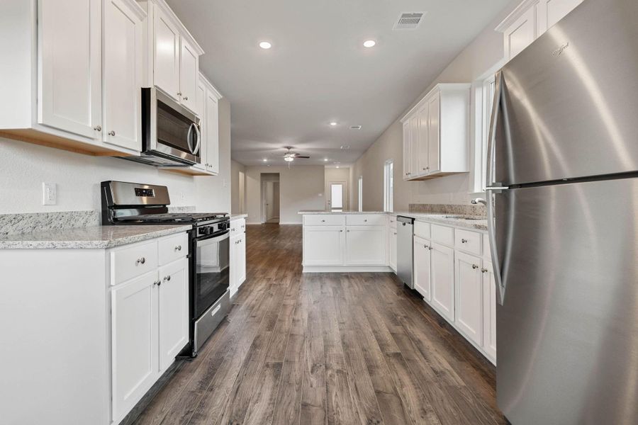 Furnished interior view inside a new home in Sweetwater Ridge, Conroe (Image 3).