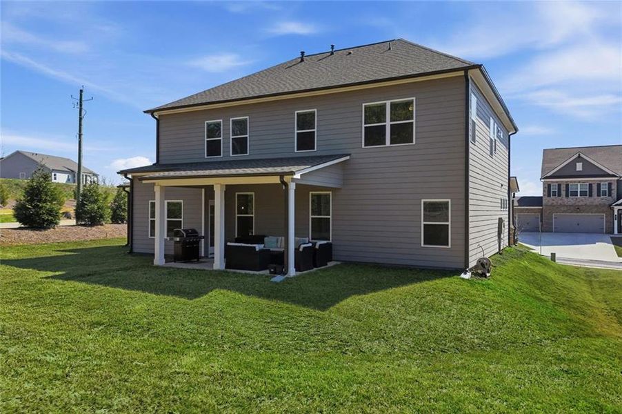 Exterior details and patio area of a home in Rosewood Lake Estates, Hoschton (Image 31). Exterior details and patio area of a home in Rosewood Lake Estates, Hoschton (Image 31).