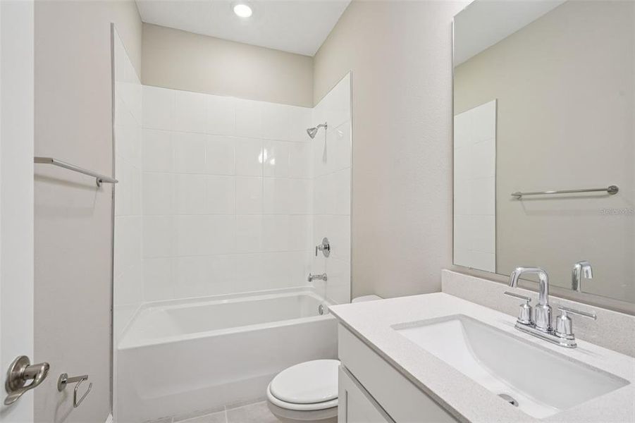 Furnished interior view inside a new home in Legends Preserve - Signature Series, Daytona Beach (Image 7). Furnished interior view inside a new home in Legends Preserve - Signature Series, Daytona Beach (Image 7).