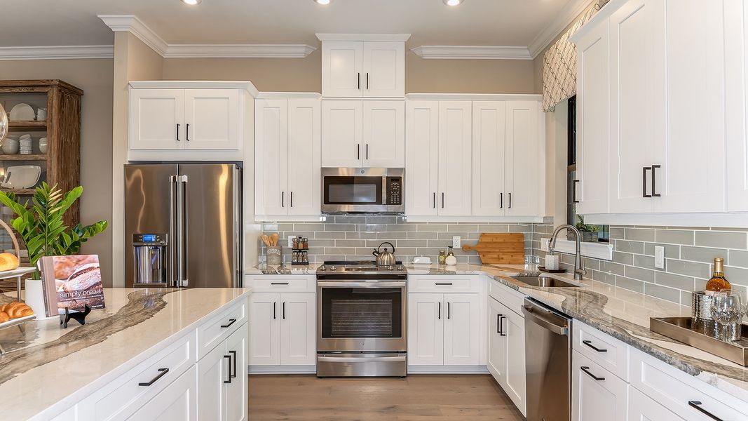 Furnished interior view inside a new home in Esplanade by the Islands Coach Homes, Naples (Image 8).