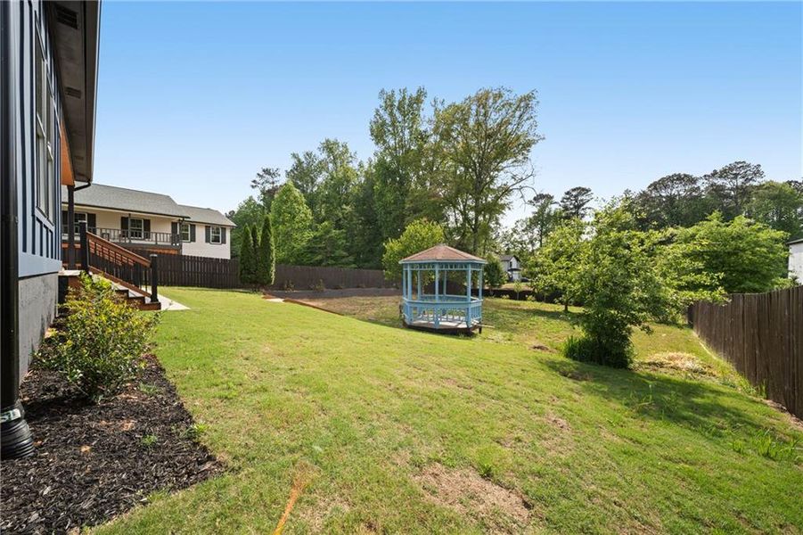 Exterior details and patio area of a home in , Acworth (Image 27).