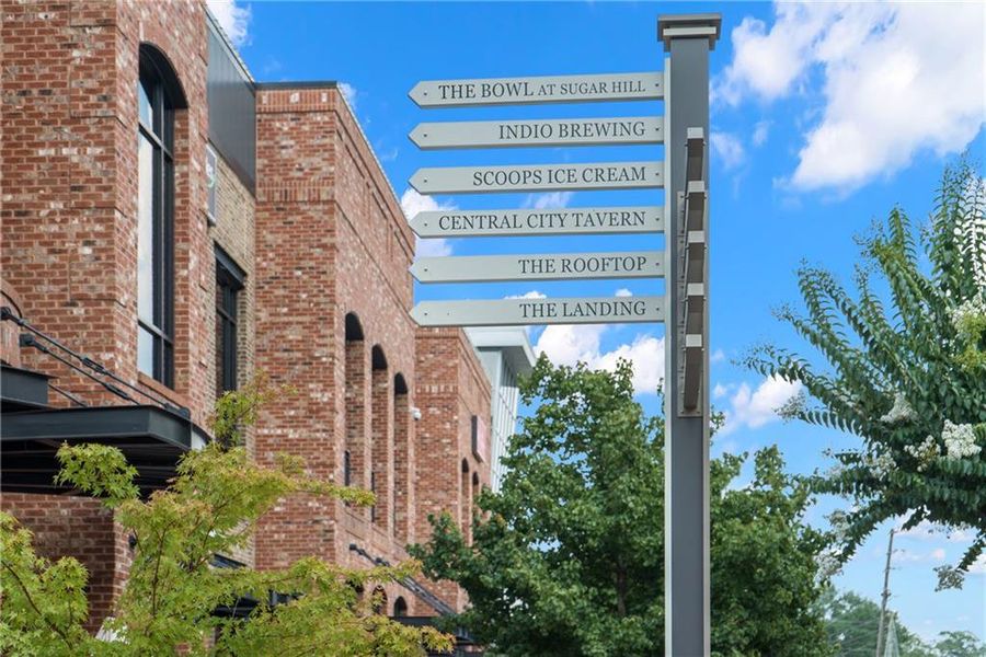 Front exterior of a new home in Millcroft Townhomes, Buford, GA, highlighting curb appeal (Image 34).
