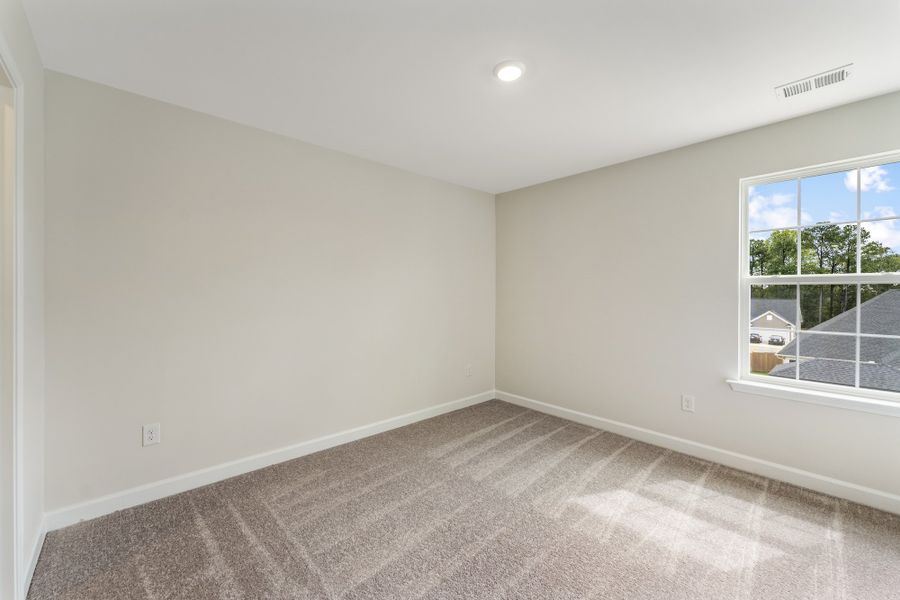 Spacious, unfurnished interior of a new home in Cottages at Lake Emory, Inman (Image 27). Spacious, unfurnished interior of a new home in Cottages at Lake Emory, Inman (Image 27).
