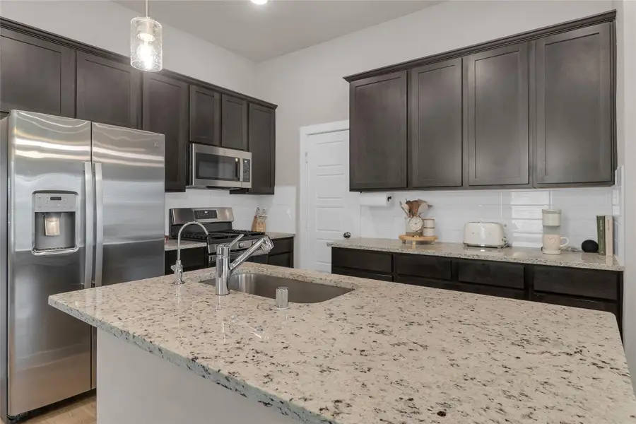 Furnished interior view inside a new home in Mustang Crossing, Alvin (Image 13).
