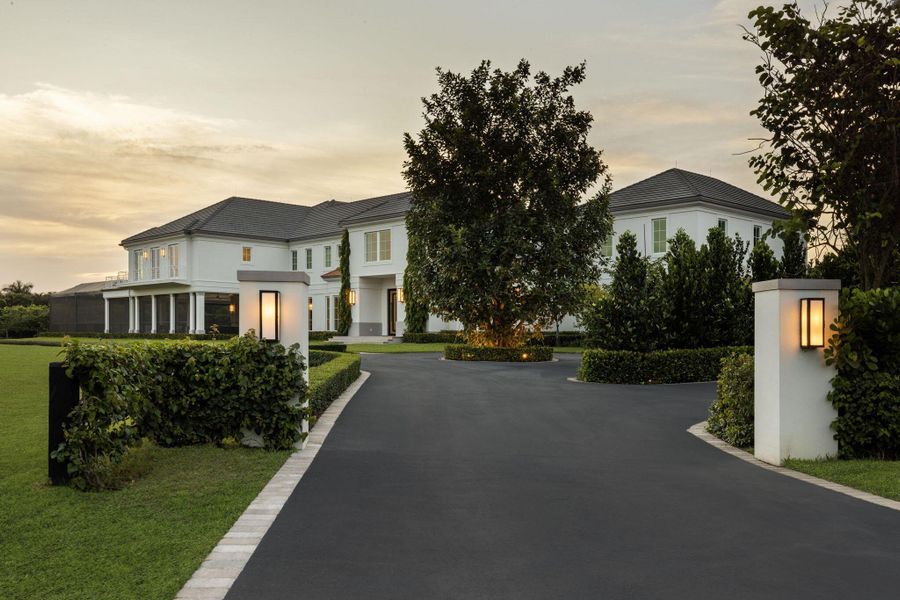 Front exterior of a new home in , Wellington, FL, highlighting curb appeal (Image 28). Front exterior of a new home in , Wellington, FL, highlighting curb appeal (Image 28).