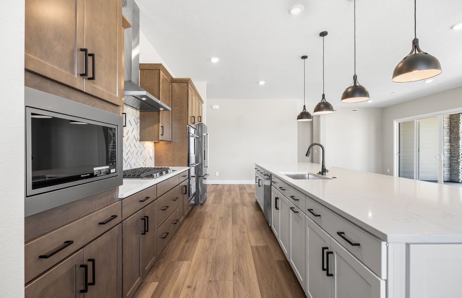 Furnished interior view inside a new home in Hilltop at Inspiration, Aurora (Image 8).
