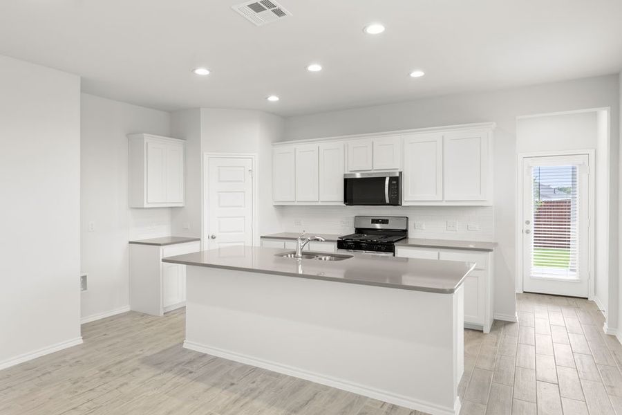 Front exterior of a new home in Northspur, Terrell, TX, highlighting curb appeal (Image 9). Front exterior of a new home in Northspur, Terrell, TX, highlighting curb appeal (Image 9).