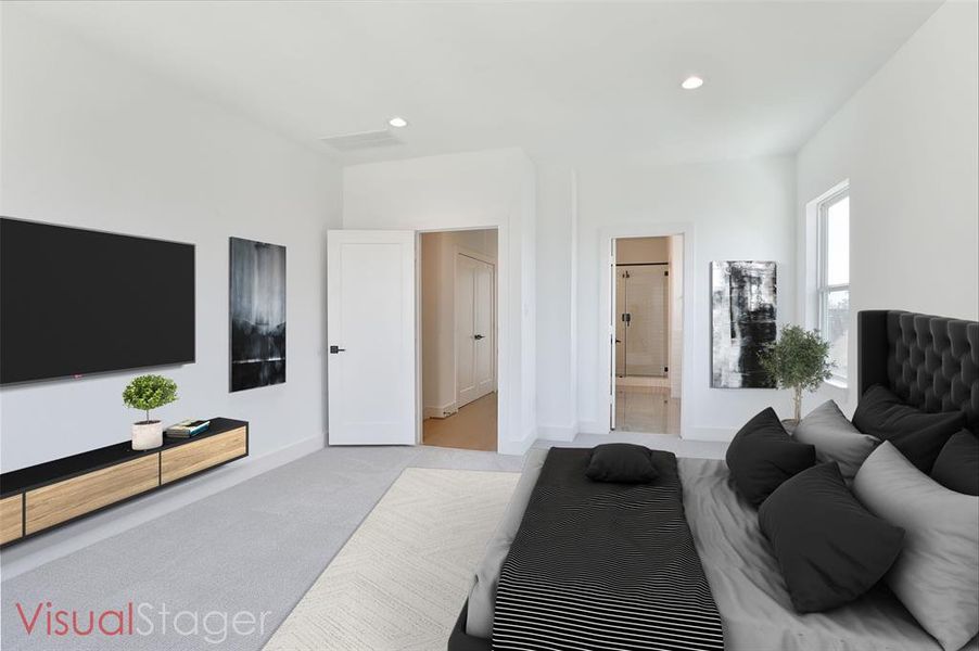 A glimpse of the ensuite, complemented by windows that surround the space.