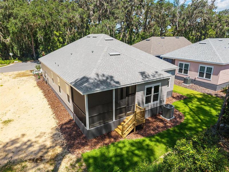 Front exterior of a new home in Fairway Pointe at West End, Newberry, FL, highlighting curb appeal (Image 30). Front exterior of a new home in Fairway Pointe at West End, Newberry, FL, highlighting curb appeal (Image 30).