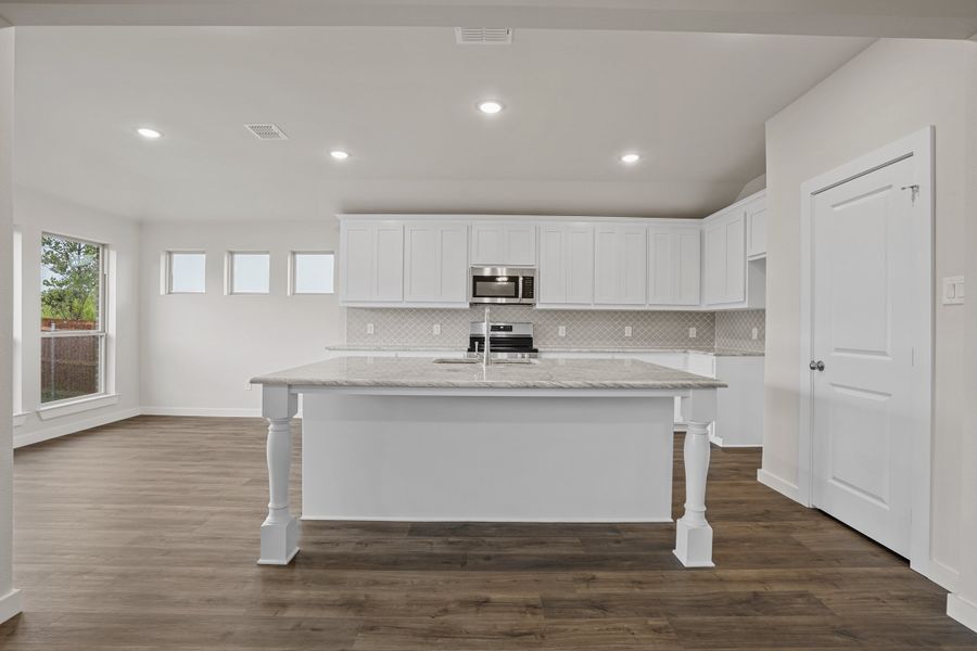 Representative furnished interior of a home built from the Waterford III by Cheldan Homes in Stoneview, Glen Rose (Image 7).