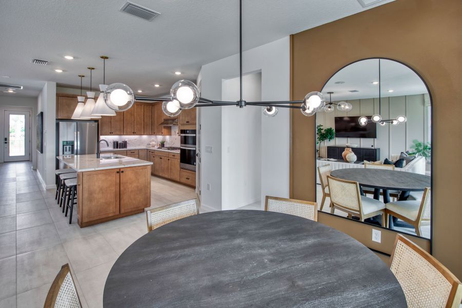 Furnished interior view inside a new home in Del Webb Tradition, Port St. Lucie (Image 8).