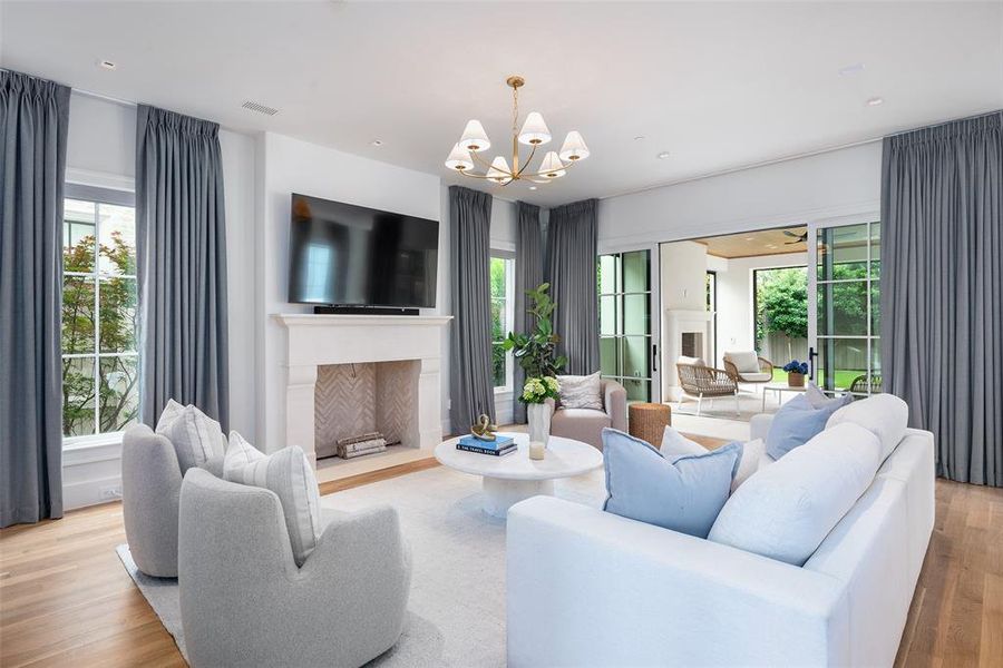 Family room with gas fireplace and designer window treatments