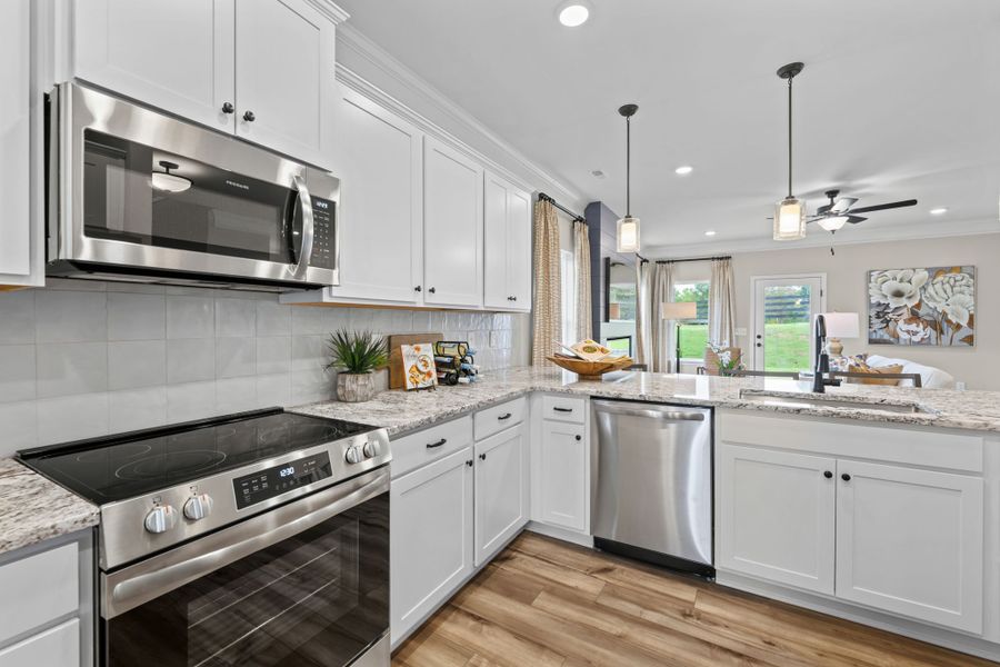 Furnished interior view inside a new home in Upton Landing, Cleveland (Image 5).