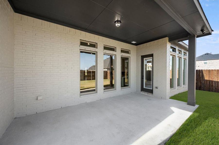 Exterior details and patio area of a home in Somerset - Phase 5, Mansfield (Image 14). Exterior details and patio area of a home in Somerset - Phase 5, Mansfield (Image 14).