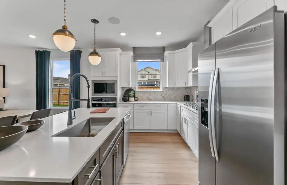 Furnished interior view inside a new home in Crosswinds, Kyle (Image 11).