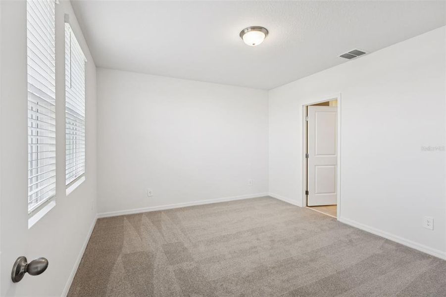 Spacious, unfurnished interior of a new home in Crosswinds - Classic Series, Haines City (Image 14).