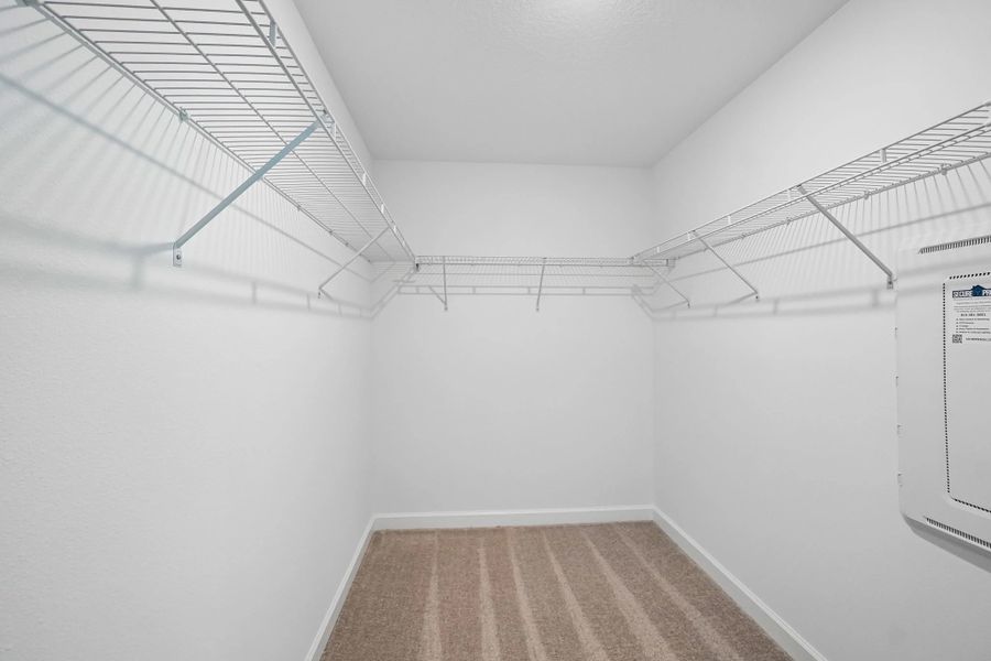 Large walk-in closet located off the primary bedroom Large walk-in closet located off the primary bedroom