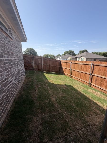 Exterior details and patio area of a home in Trail Creek, Cleburne (Image 16). Exterior details and patio area of a home in Trail Creek, Cleburne (Image 16).