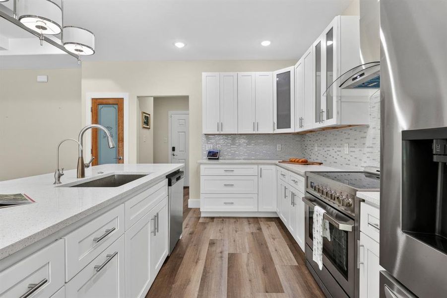 Side view of kitchen and stainless steel sink, water filter installed in the house for filter drinking water, and stainless package.