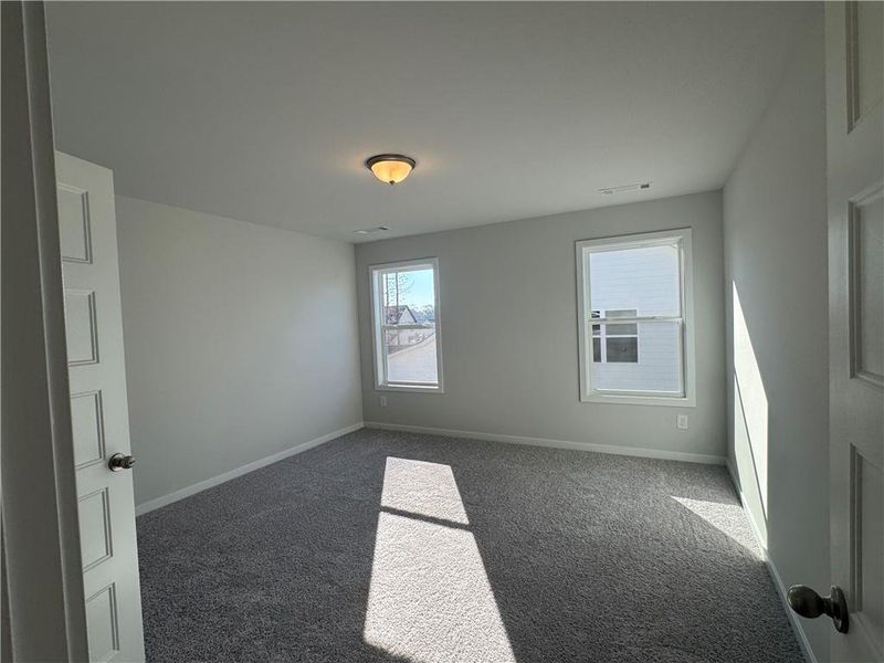 Spacious, unfurnished interior of a new home in Rosewood Lake Preserve, Hoschton (Image 27).