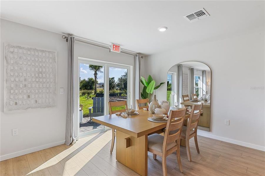 Furnished interior view inside a new home in Central Parc, North Port (Image 6).