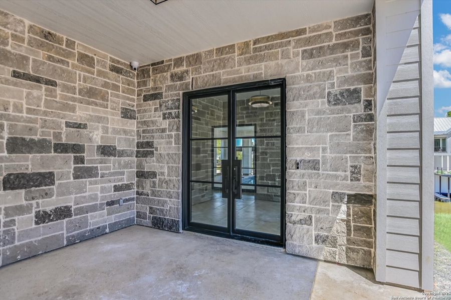 Exterior details and patio area of a home in , Kingsland (Image 3).