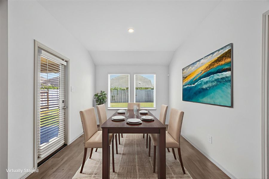 This spacious dining area is perfectly situated between the kitchen and the covered patio, offering a seamless flow for everyday living and entertaining. This spacious dining area is perfectly situated between the kitchen and the covered patio, offering a seamless flow for everyday living and entertaining.