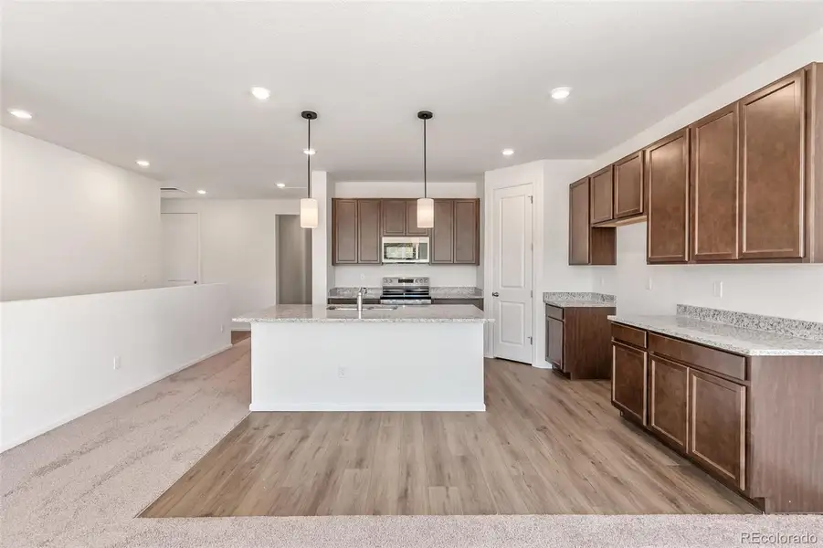 Furnished interior view inside a new home in Terrain Oak Valley, Castle Rock (Image 4).