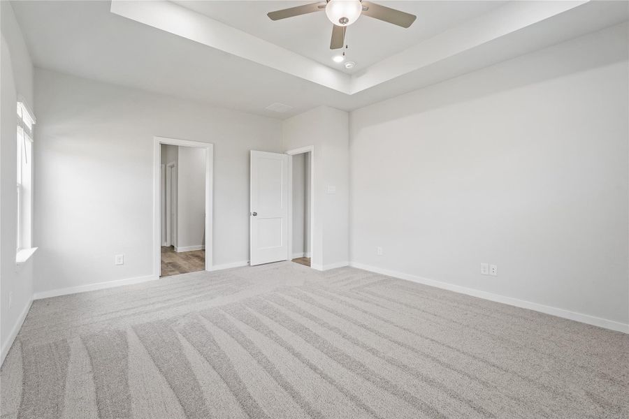 Spacious, unfurnished interior of a new home in Sunterra, Katy (Image 19).