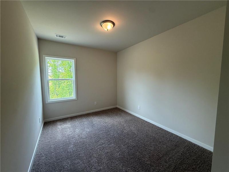 Spacious, unfurnished interior of a new home in Ponderosa Farms Estates, Gainesville (Image 35).