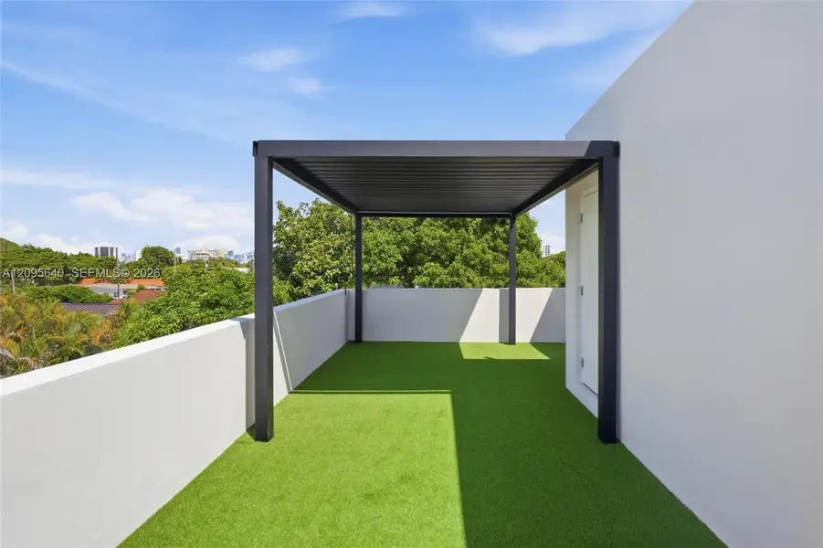 Exterior details and patio area of a home in , Miami (Image 24).