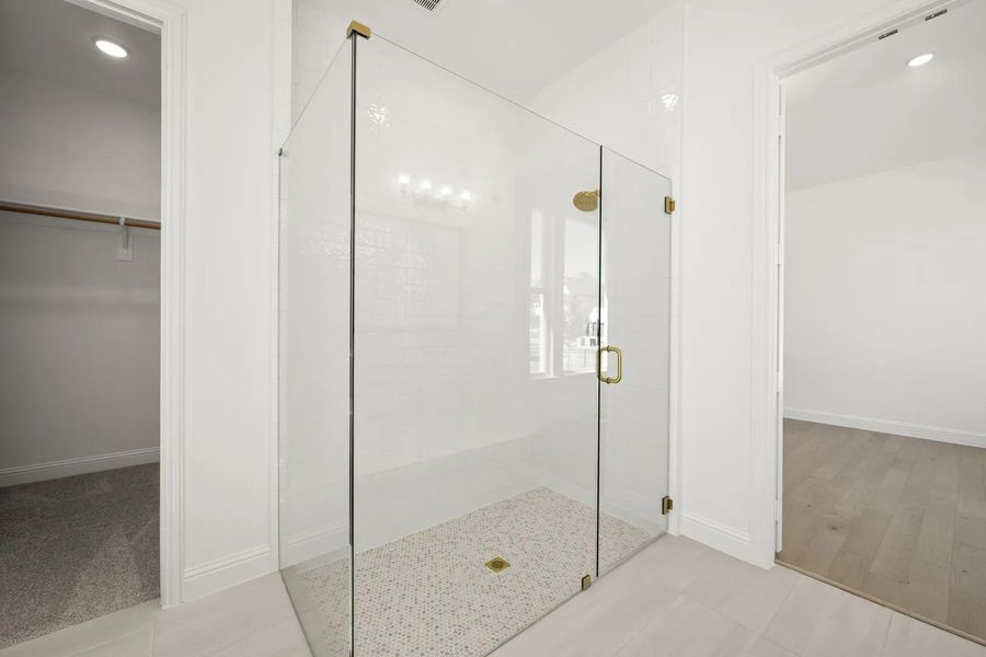 The Violet E Primary Suite Bathroom The Violet E Primary Suite Bathroom